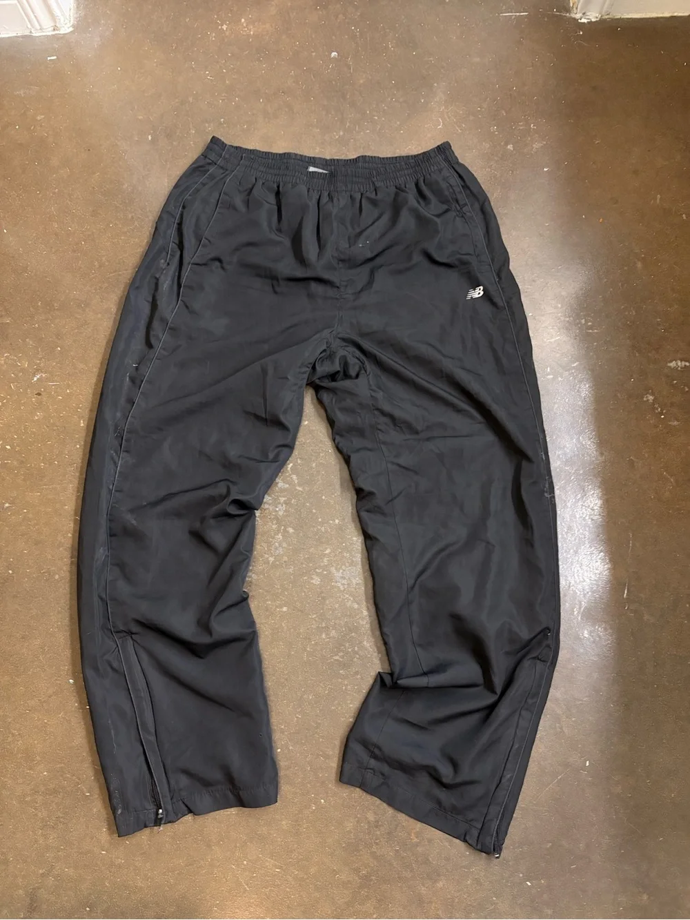 New Balance Men’s Black Track Pants with Zipper Hems